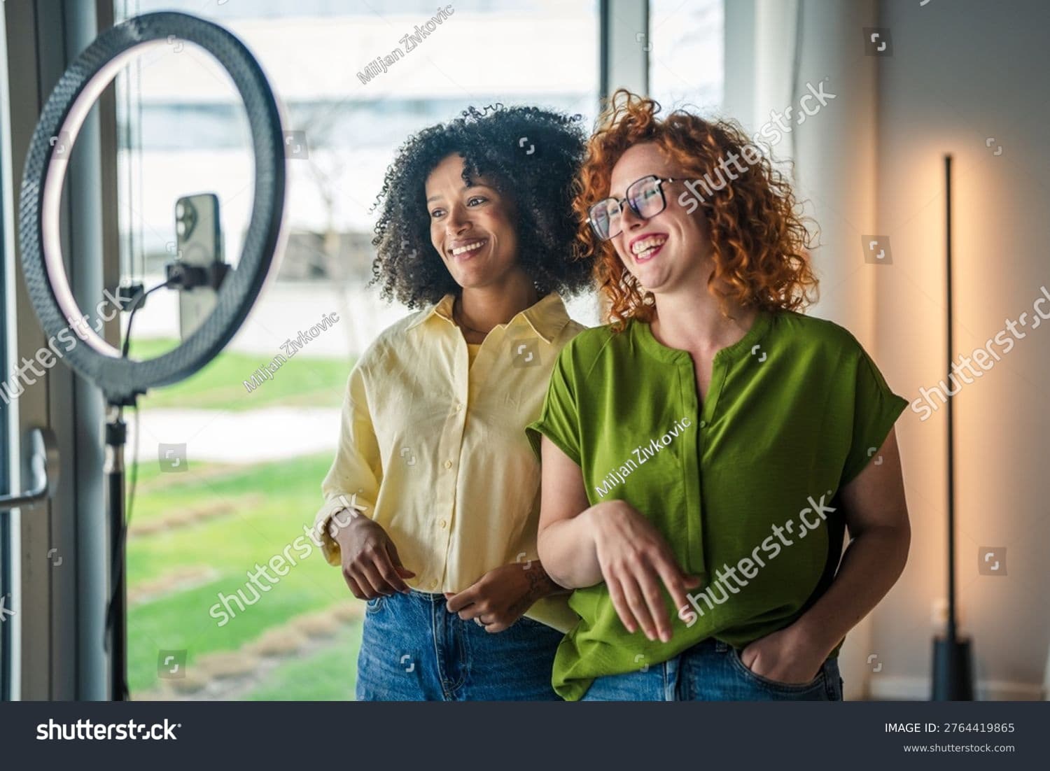 Creators collaborating with ring light